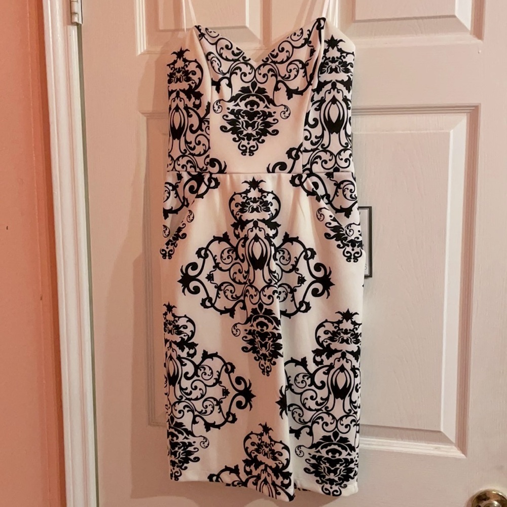 White and black strapless dress